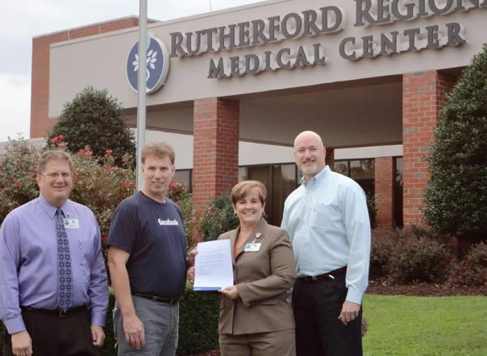 Facebook recently awarded a Community Action Grant to Rutherford Regional Health System and PANGAEA that will be used to construct fiber optic cable to connect the hospital hub with Chase Family Care and Insights Psychiatric Resources. Pictured are, from left, John Domansky, chief operating officer of Rutherford Regional Health System; Keven McCammon of Facebook; Cindy Buck, chief executive officer of Rutherford Regional Health System; and Ron Walters, executive director of PANGAEA.